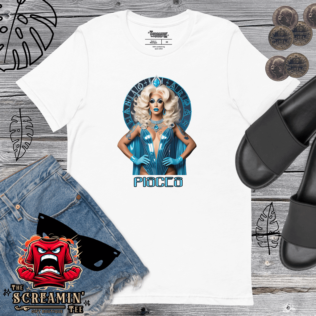 Haus Of Zodiac T-Shirt | Oceania Dreams (Pisces) displayed with denim shorts and sandals on a wooden background.