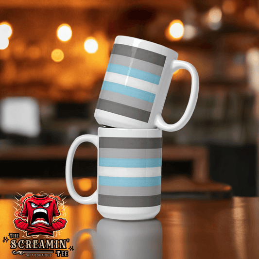 Demigender Demiboys Pride Mug displayed in a cozy café setting with blue and gray stripes.