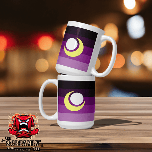 Enbian Pride Mug with bold purple and black design stacked on a wooden table.