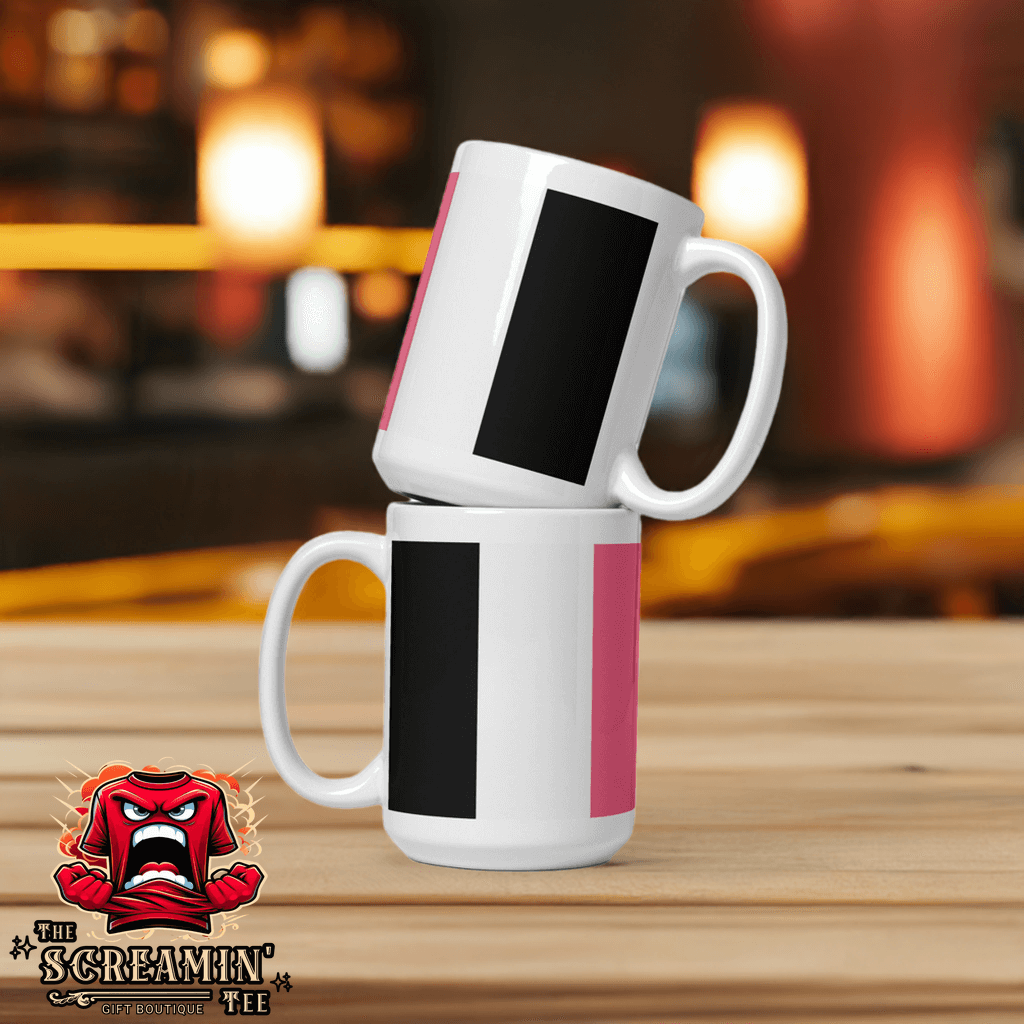 Two Femeric Pride Mugs stacked on a wooden table, showcasing vibrant colors and sturdy design for everyday use.