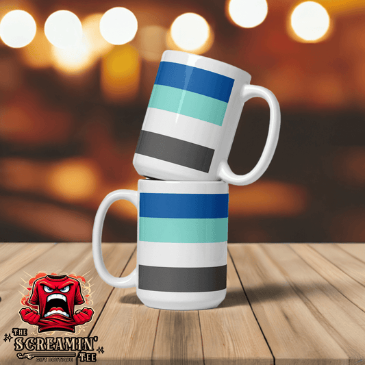 Two Freysexual Pride Mugs stacked on a table, showcasing vibrant colors against a blurred background.