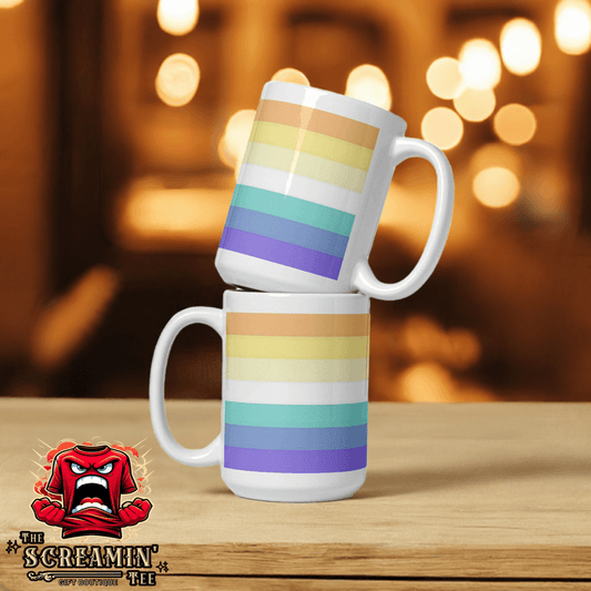 Two Genderfaun Pride Mugs with a colorful striped design stacked on a wooden table against a blurred background.