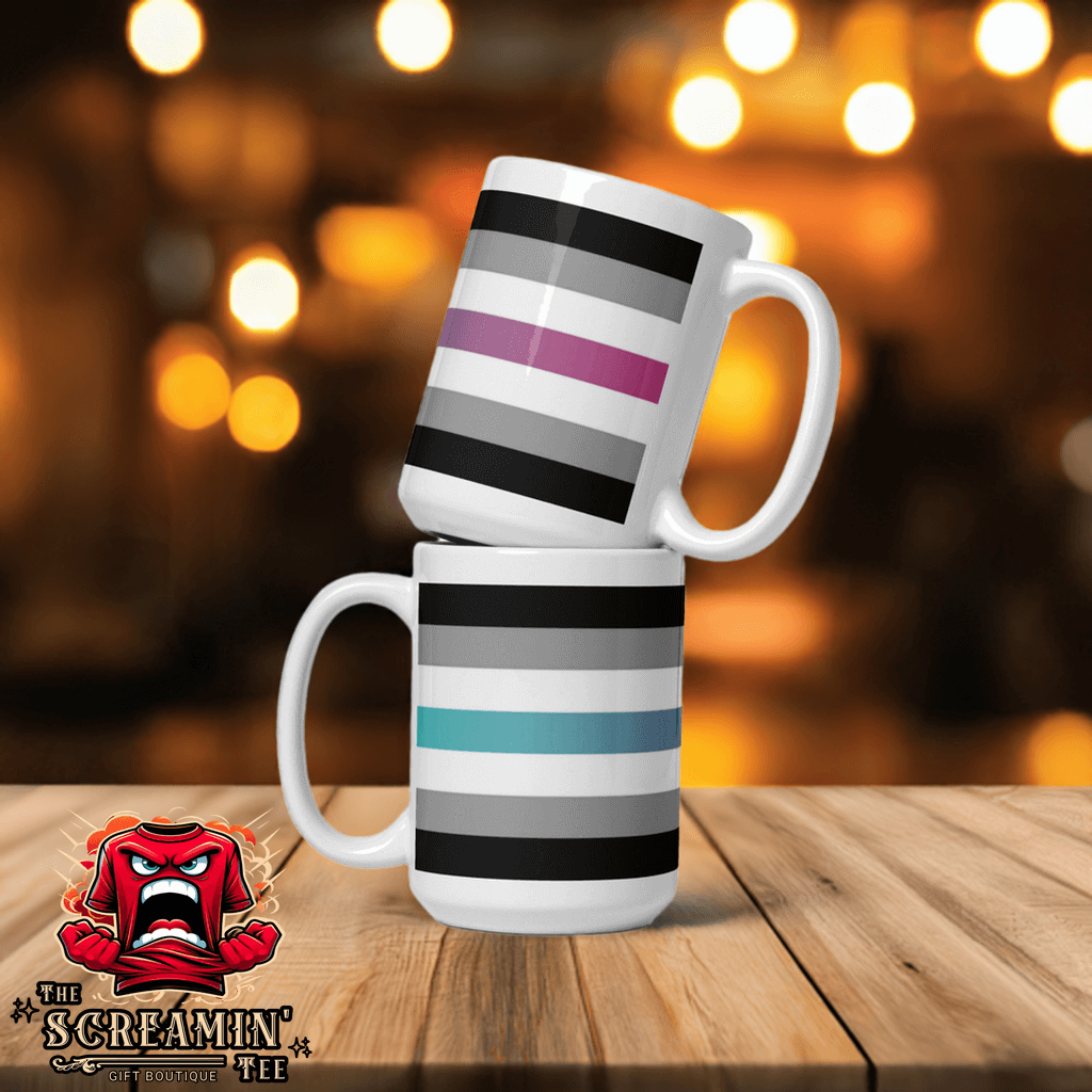 Libragender Pride Mug featuring stacked mugs with colorful stripes against a blurred background of warm lights.