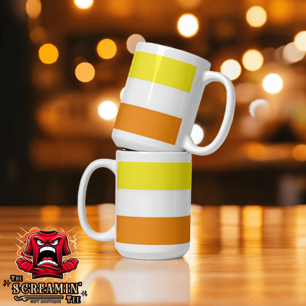 Two Maverique Pride Mugs stacked, featuring vibrant stripes against a blurred background, ideal for any beverage.