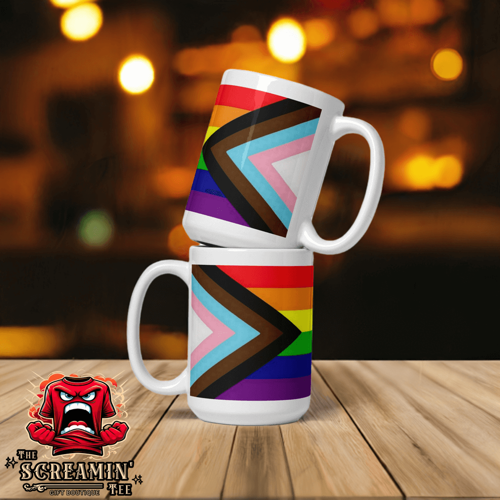 Progress Inclusive Pride Mug showcasing vibrant colors on a sturdy ceramic design, perfect for coffee or tea.