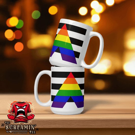 Straight Ally Pride Mug stacked on a wooden surface with a colorful rainbow design, perfect for coffee or tea.