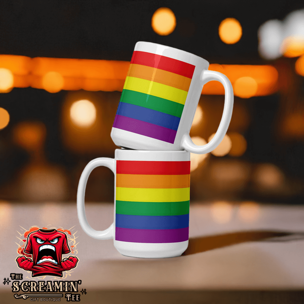 Traditional Pride Mug displayed in a stacked arrangement with a vibrant rainbow pattern against a blurred background.