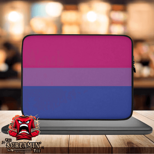 Bisexual Pride Laptop Sleeve featuring a vibrant pink and blue design on a cozy laptop sleeve.