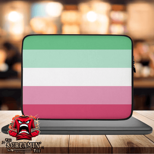 Abrosexual Pride Laptop Sleeve displayed on a table, featuring a stylish striped design in green, white, and pink.