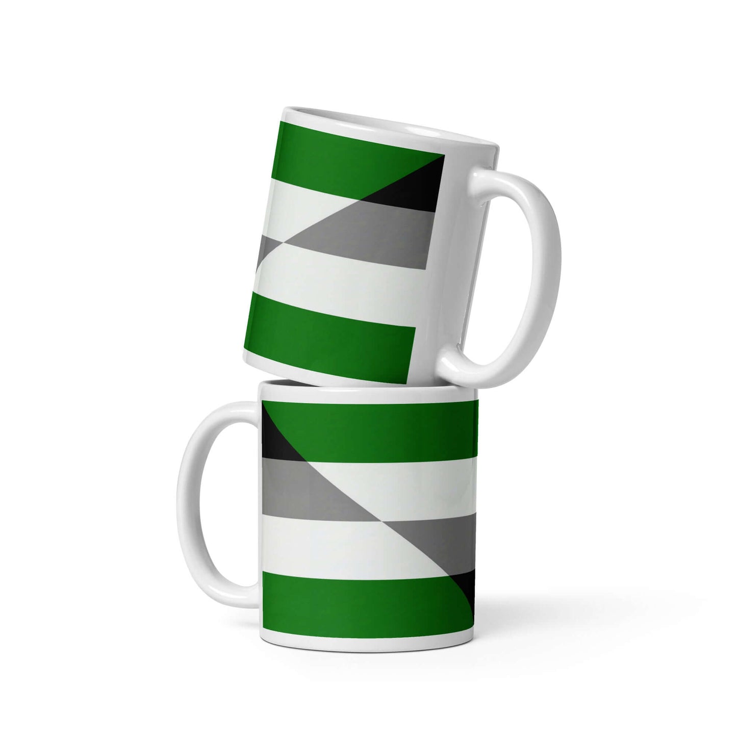 Two Aegoromantic Pride Mugs with green, gray, and white geometric patterns stacked on a white background.