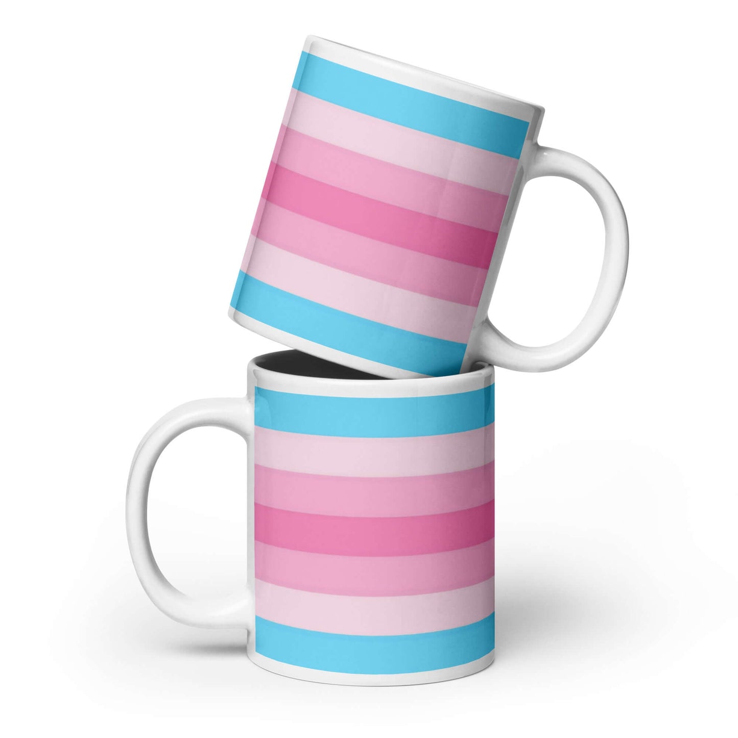 Transfem Pride Mug featuring vibrant pink and blue striped design, perfect for coffee or tea.